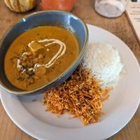 Chickpea and squash tikka masala with rice and carrot and toasted coconut salad 🤤 at The Pod in Coventry