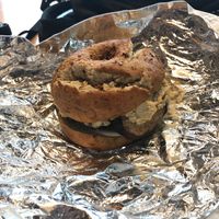 Breakfast of champions sandwich on onion bagel at Jennifer Lee's Gourmet Bakery in Boston