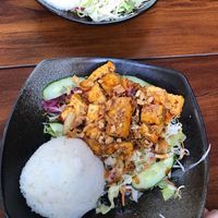 Spicy tofu with salad and rice   at Chay Umi in Berlin