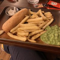 Battered banana blossom, mushy peas, skin on fries and vegan tartare sauce makes a convincing fish n chips  at The Cornish Vegan in Truro