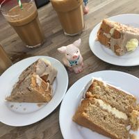 Peanut butter and raspberry cake, chai latte cake and oat milk iced lattes at The Cornish Vegan in Truro