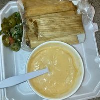Tamales, (jalapeños from nachos), and big yummy cheese  at El Palote Panaderia in Dallas