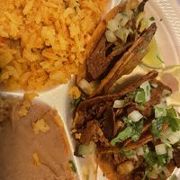 Birria tacos plate - took a pic after I already ate one because I couldn’t wait!  at El Palote Panaderia in Dallas