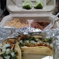 carnitas tacos with rice and beans at El Palote Panaderia in Dallas