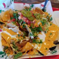 $13.25 Nachos, really delicious, a bit expensive, easily serves two people at El Palote Panaderia in Dallas