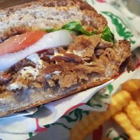 Torta Barbacoa with side of fries & queso at El Palote Panaderia in Dallas