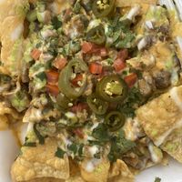 nachos with carne guisada at El Palote Panaderia in Dallas