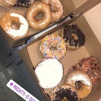 Left box (2 Oreos, 2 Good O’l Glazed, 1 Lemon Poppy, 1 French Toast) ….. Right box (2 Oreos, 1 Birthday Cake, 2 French Toast, 1 Fritter)  at Mighty-O Donuts - Ballard in Seattle