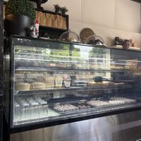 Cake cabinet  at Mr Black Juicery in Berwick