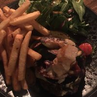 Zucchini macadamia burger with mushroom, vegan cheese, grilled veggies at The Bank on Collins in Melbourne