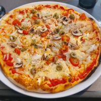 Pizza VEGAN (mozzarella vegetal, champignon,oignons, tomates et olives)
Excellente !! 👌🏼 at Pizzeria Pasta Da Nando in Perpignan