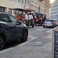Passing beer bikes at Vegan Kiosk in Bratislava