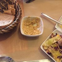 Tiny portion of Hummus- cost 3€, the menu said it should come with Beetroot Hummus, but it didn’t. This was very bland and tasteless. at Organic's in Sevilla