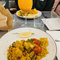 Paella is served tableside for you   at Gusto Ristobar in Sevilla