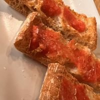 Pan con tomate   at Gusto Ristobar in Sevilla