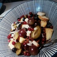 Muesli (with honey) and oatmilk on the side at Napoljonska in Berlin