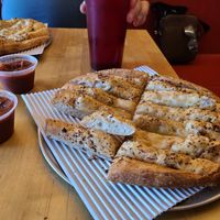 Vegan garlic bread with marinara sauce at Pie-Sci in Detroit