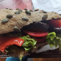 Heerlijk vegan broodje met aubergine, paprika, tomaat, sla en pesto! at Bakkerij Goeiemorgen in Berchem