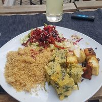 fried tofu with cous cous and salad at Sabor K Intende in Lisbon