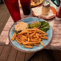 Beyond meat cheese burger, on lettuce with mashed avocado and raw onion.   at JD's in Provincetown
