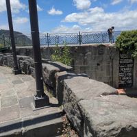 The entrance is located *under* the mirador, which is the rooftop of the restaurant at Tandana in Quito