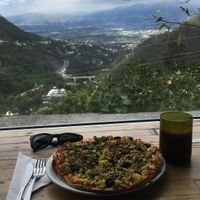 Pizza with tofu, olives and pinapple. One of the best pizzas I have eaten! at Tandana in Quito