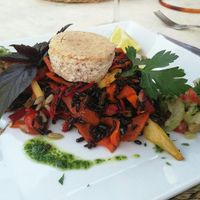 Fried black rice, red pepper and carrot with celeriac salad and almond feta cheese.  at Restaurant Quay in Mallorca