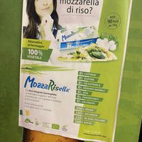 Sign with what cheese they use, made of rice   at LA Pizza in Aviano