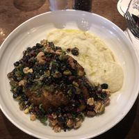 Dukkah spiced cauliflower steak with cauliflower purée, pistachio, walnuts, chili and dried currants  at The Oaks in Neutral Bay