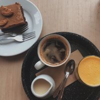Biscoff Slice, Americano w milk & Turmeric Latte  at The Canvas: Shoreditch in East London