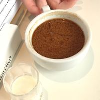 weird milk in coffee! at The Canvas: Shoreditch in East London