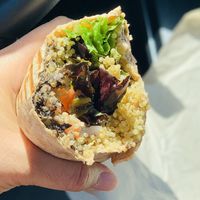 2022.APRIL29- vegan wrap, Middle of wrap small vegan veggie patty appears   at Eat Real Cafe in Santa Clarita