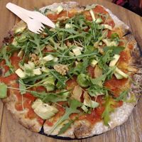 Rucola Pizza with baked dough at #RAW VEGAN FIRENZE in Florence