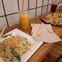 Pad thai, "tuna & onion pizza, cold-pressed juice  at #RAW VEGAN FIRENZE in Florence
