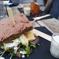 Focaccia rossa con Cecina, avocado, spinacino, vegan cheese e pomodori at #RAW VEGAN FIRENZE in Florence