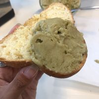 Brioche con granita di pistacchio  at Bar Dolcezza in Catania