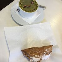 Cannolo and a pistachio desert  at Bar Dolcezza in Catania