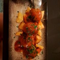 Albondigas de soja con patatas y tomates at La Veganesa in Cadiz