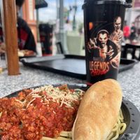 Pasta bolognese with butter free breadstick.   at Louie's Italian Restaurant in Orlando