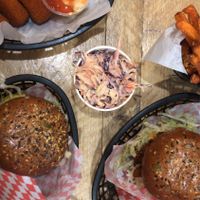 Fish burger, mushroom burger (special) coleslaw, fries & mozzarella sticks  at Mooshies in East London