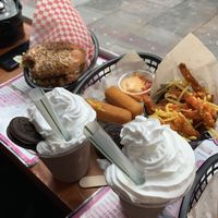 Cheese sticks, mushroom burger, cheesy sweet potato fries  at Mooshies in East London