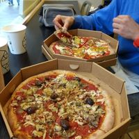Capricciosa (near) and Vegetariana pizzas at Bella&Brava in Venice