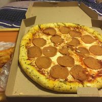 Pepperoni pizza and fries  at Veggino's Pizza in Mexico City