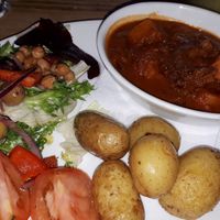 Roasted butternut squash, red onion and cranberry tagine at The Golden Heart Inn in Gloucester