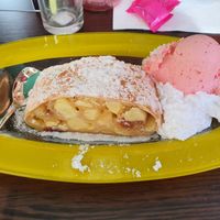 Apfelstrudel with whipped cream and strawberry ice cream at Werners Eiscafe in Wismar