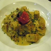 Fricassée de Tempeh with Curcuma and Coconut Milk Sauce at Cafe Enning  in Lausanne
