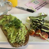 This cost £7.50...Where is the rest of my bread and why would I want a salad with my breakfast?  at Hula Juice Cafe in Edinburgh