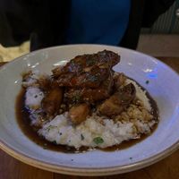 Seitan Risotto with potato wedges at Teva in Rio De Janeiro