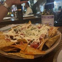 Nachos tasted very good, better than they look in the picture. Whole lot of beans on the bottom.  at Teva in Rio De Janeiro