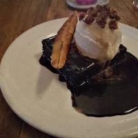 Chocolate brownie w/ coconut and vanilla ice cream. Delicious!  at Teva in Rio De Janeiro